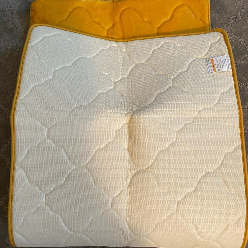 Yellow memory foam bath mat.